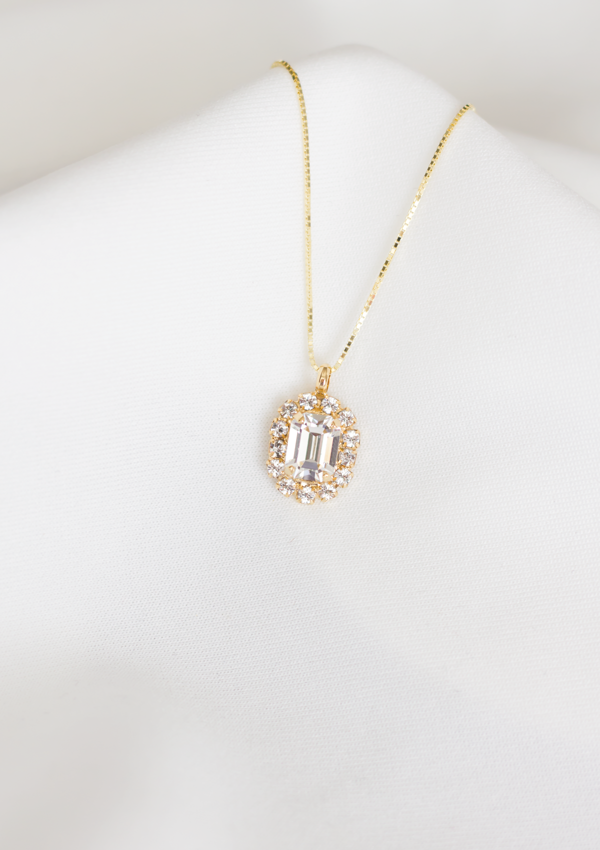 Sparkling Mini Cambridge Necklace, jewelry designed and made by Sarah Gauci in Malta. 925 Sterling Silver base Chain, 24K Gold Plated. Crystal Clear.
