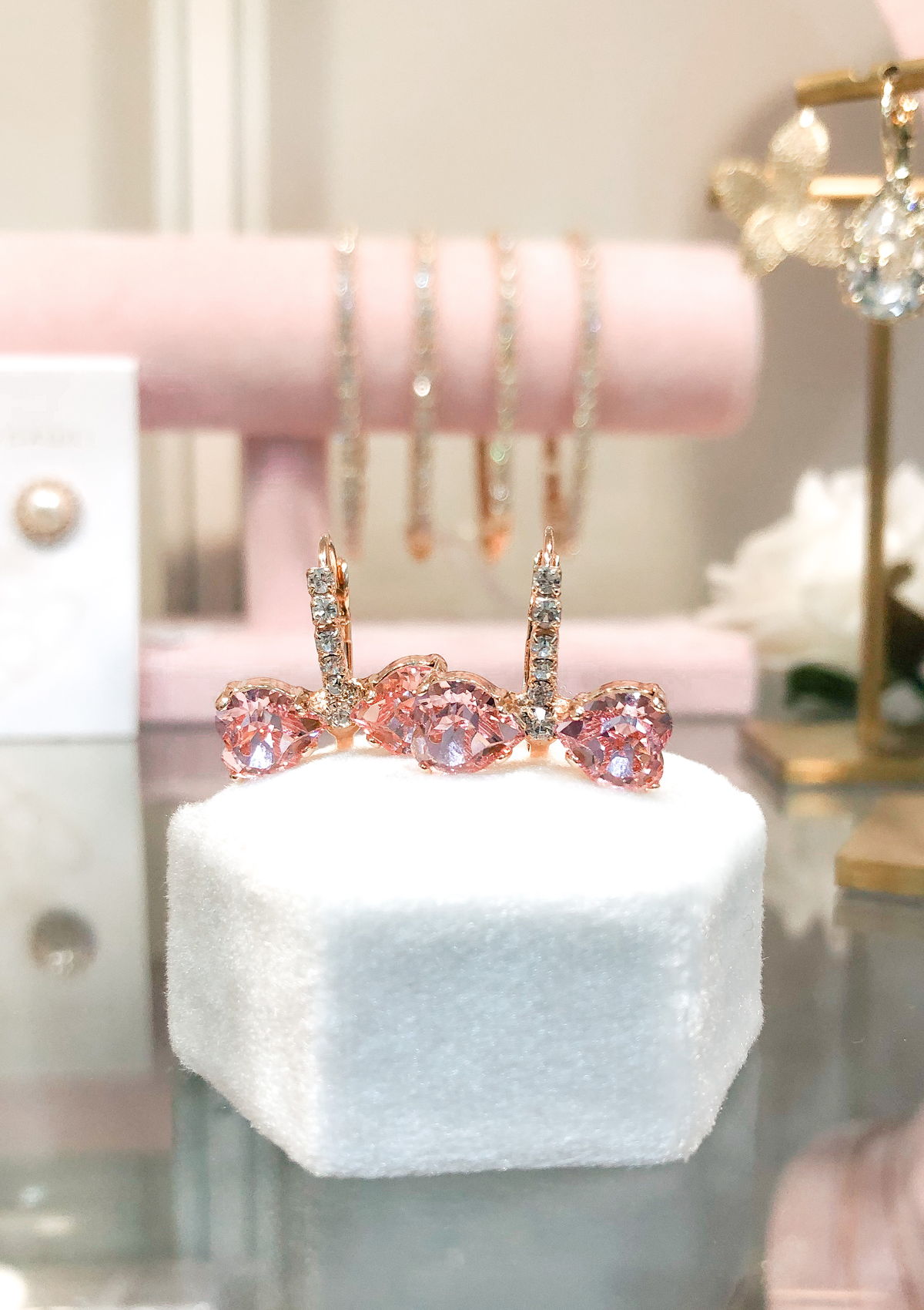 Marie Bow earrings, jewelry designed and made by Sarah Gauci in Malta. Rose Gold Plating.
