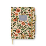 Floral patterned notebook with '2026' on a beige background
