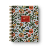 Floral patterned planner with a red label on a white background
