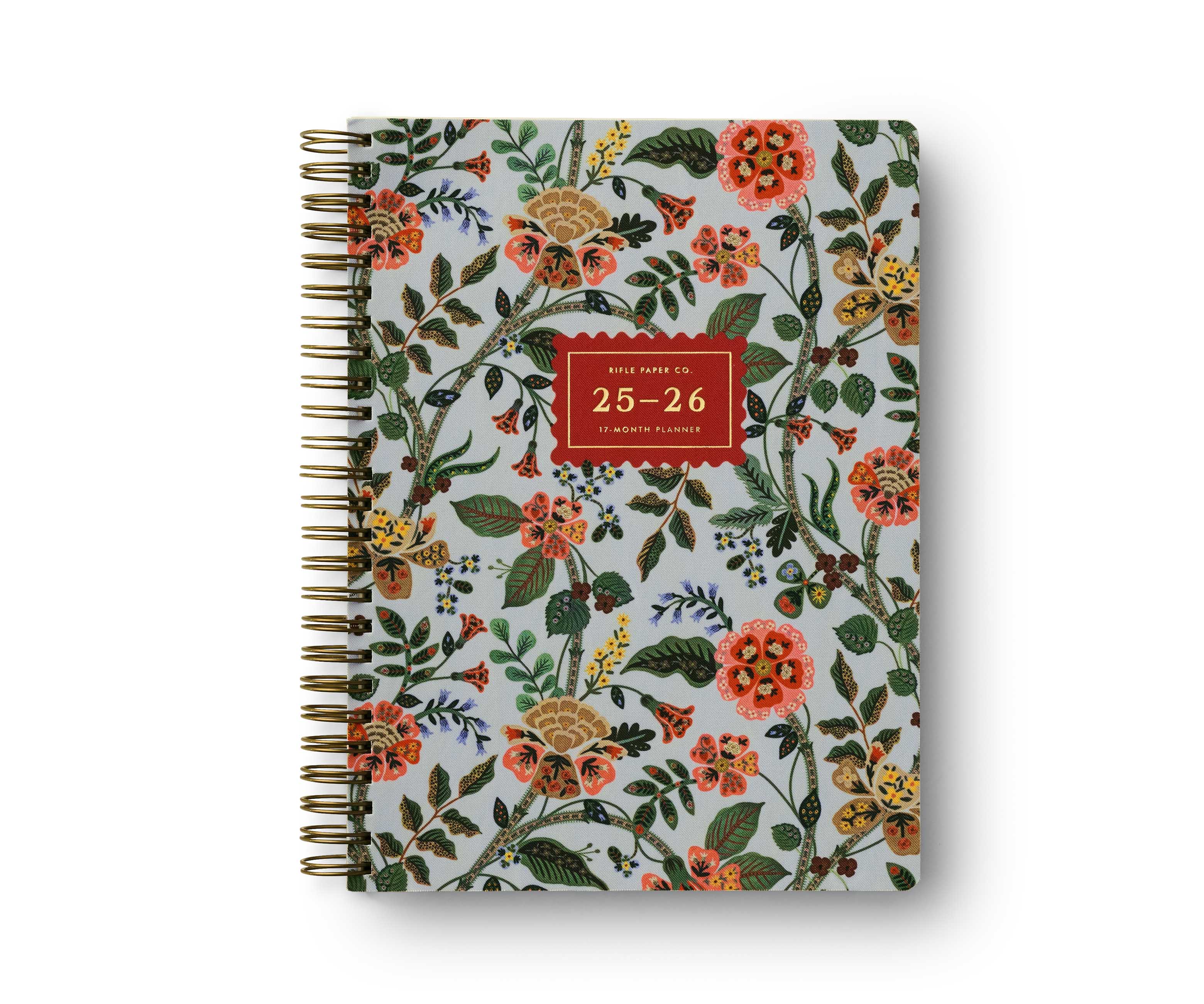 Floral patterned planner with a red label on a white background