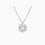 Silver necklace with a floral pendant on a white background