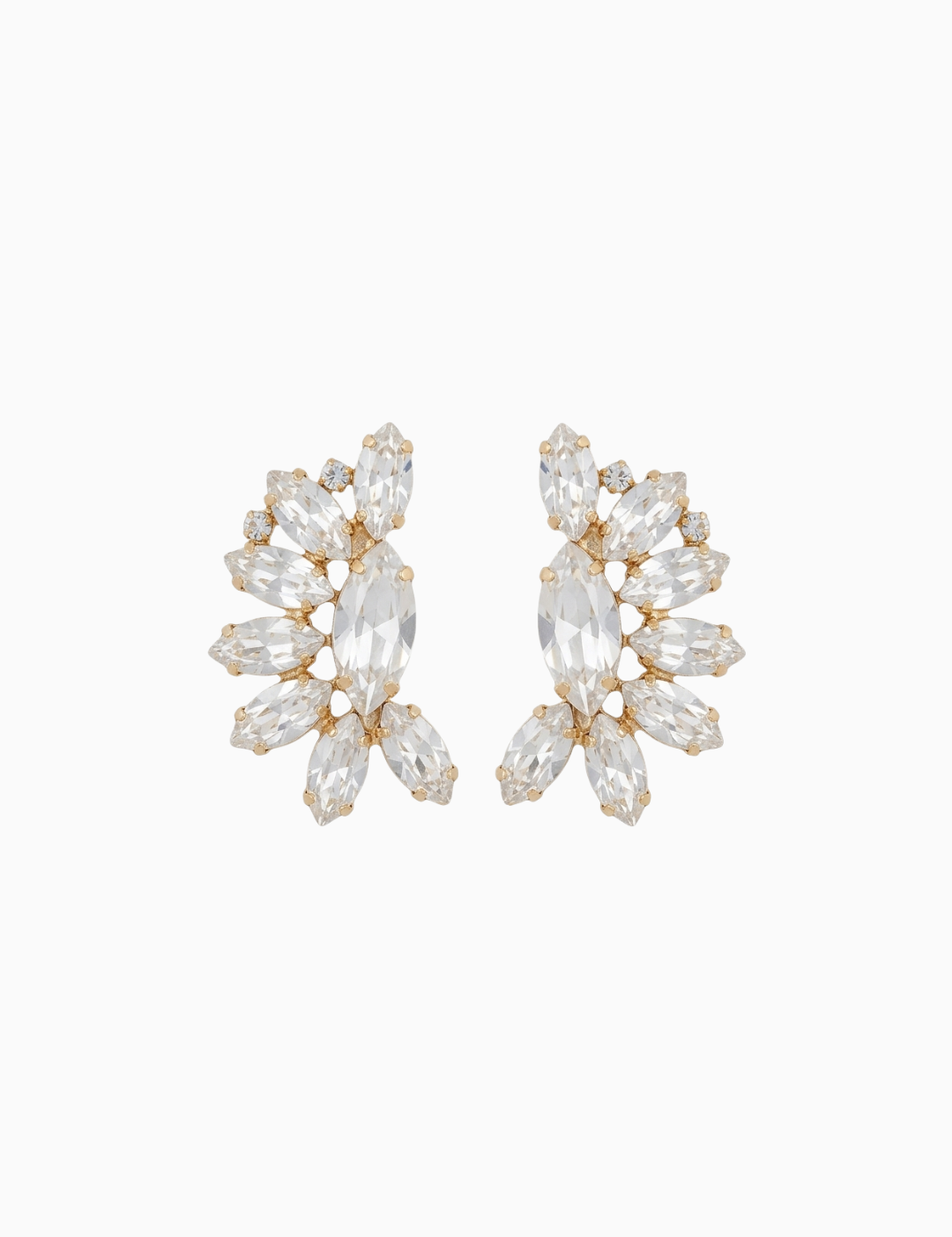 Pair of gold and crystal earrings on a white background