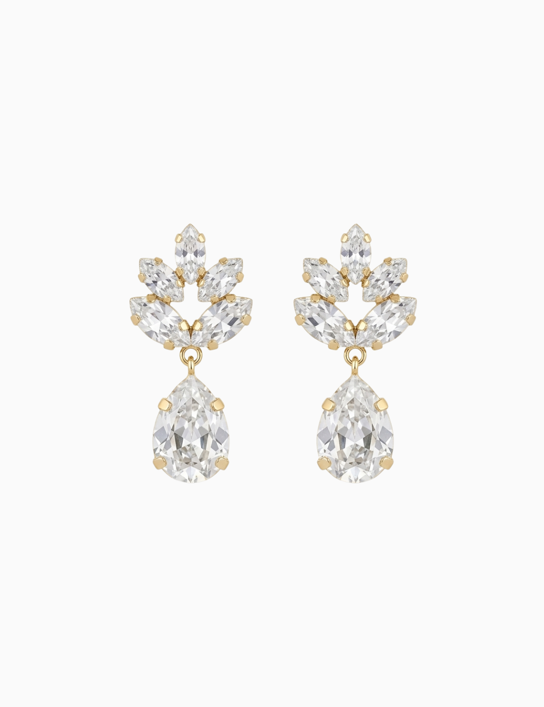 Pair of gold and clear crystal earrings on a white background