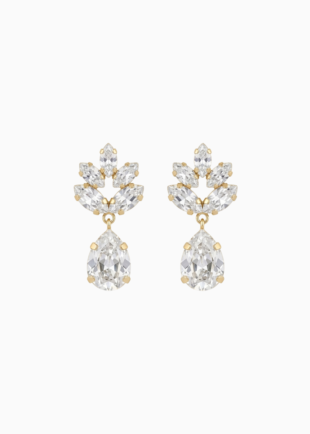 Pair of gold and clear crystal earrings on a white background