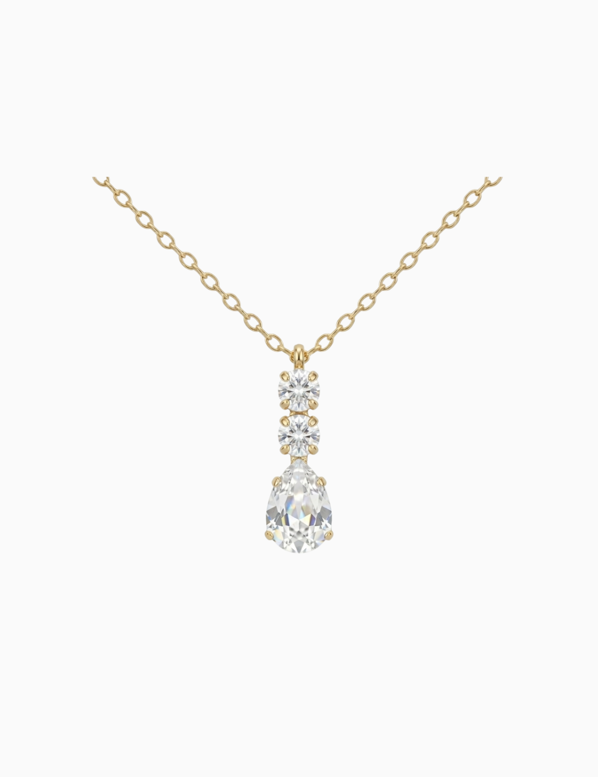 Gold necklace with a teardrop-shaped diamond pendant on a white background