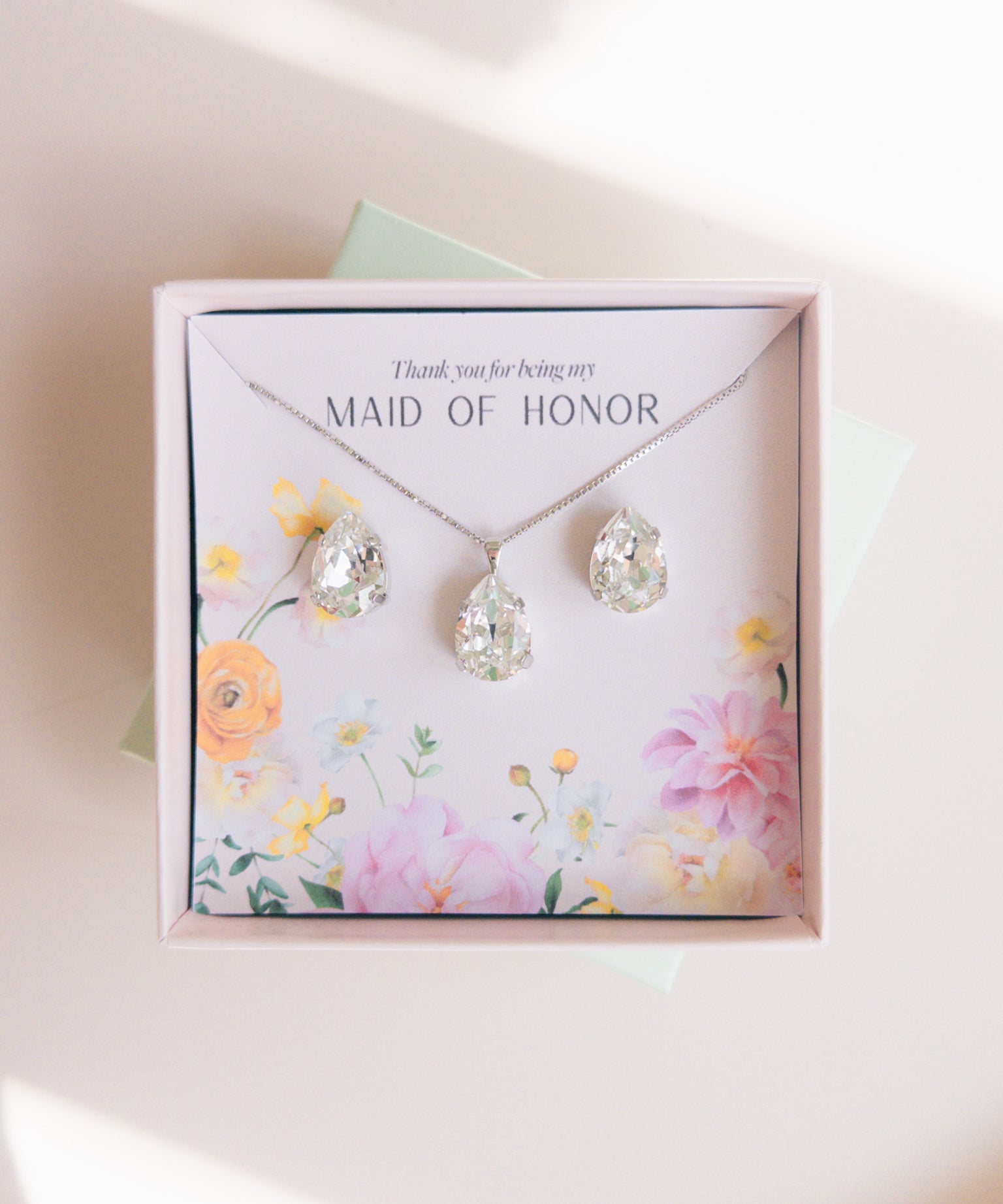 A gift set for a maid of honor consisting of teardrop-shaped crystal studs and a matching pendant necklace, Gift for Bridesmaids and Bridal Party