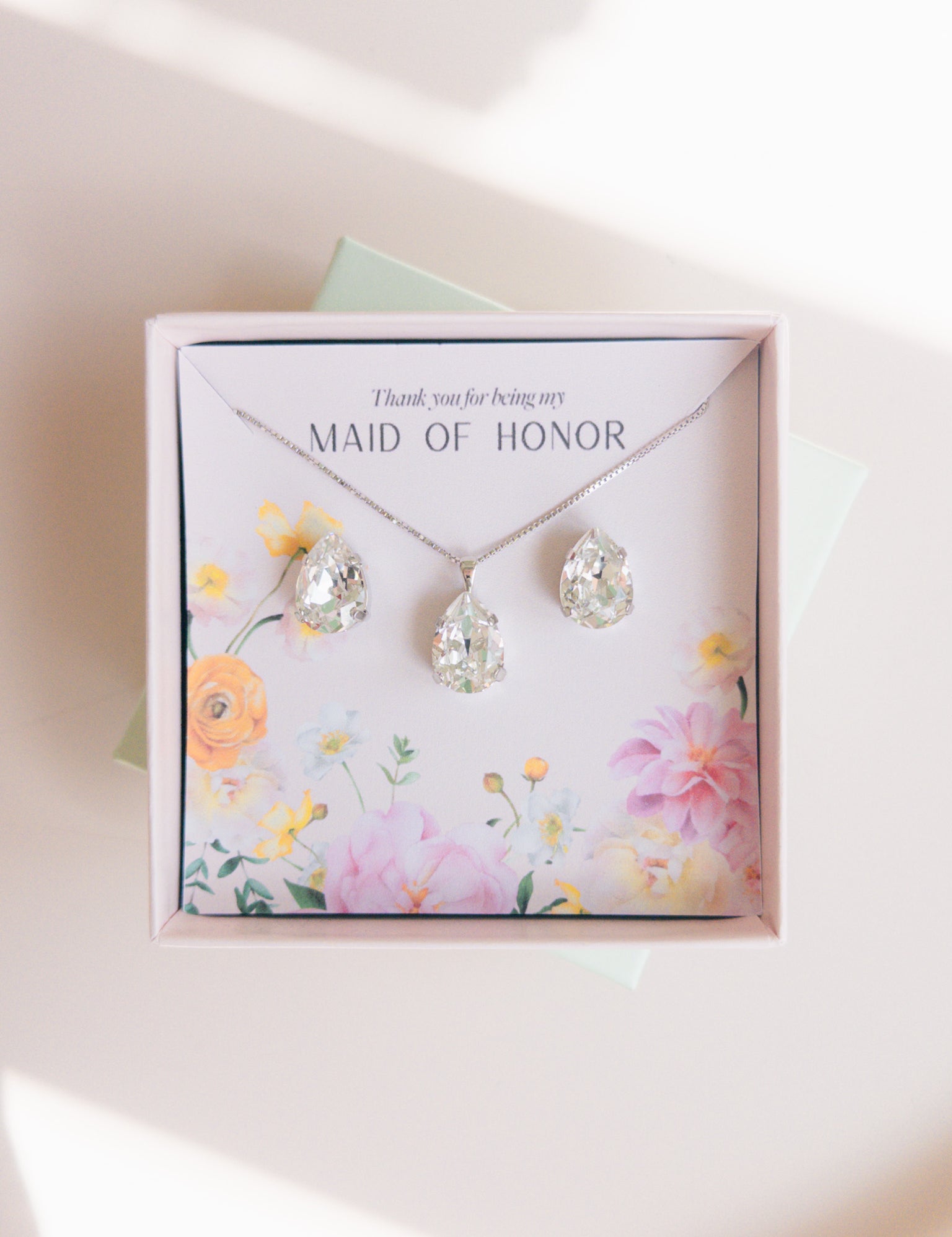 A gift set for a maid of honor consisting of teardrop-shaped crystal studs and a matching pendant necklace, Gift for Bridesmaids and Bridal Party