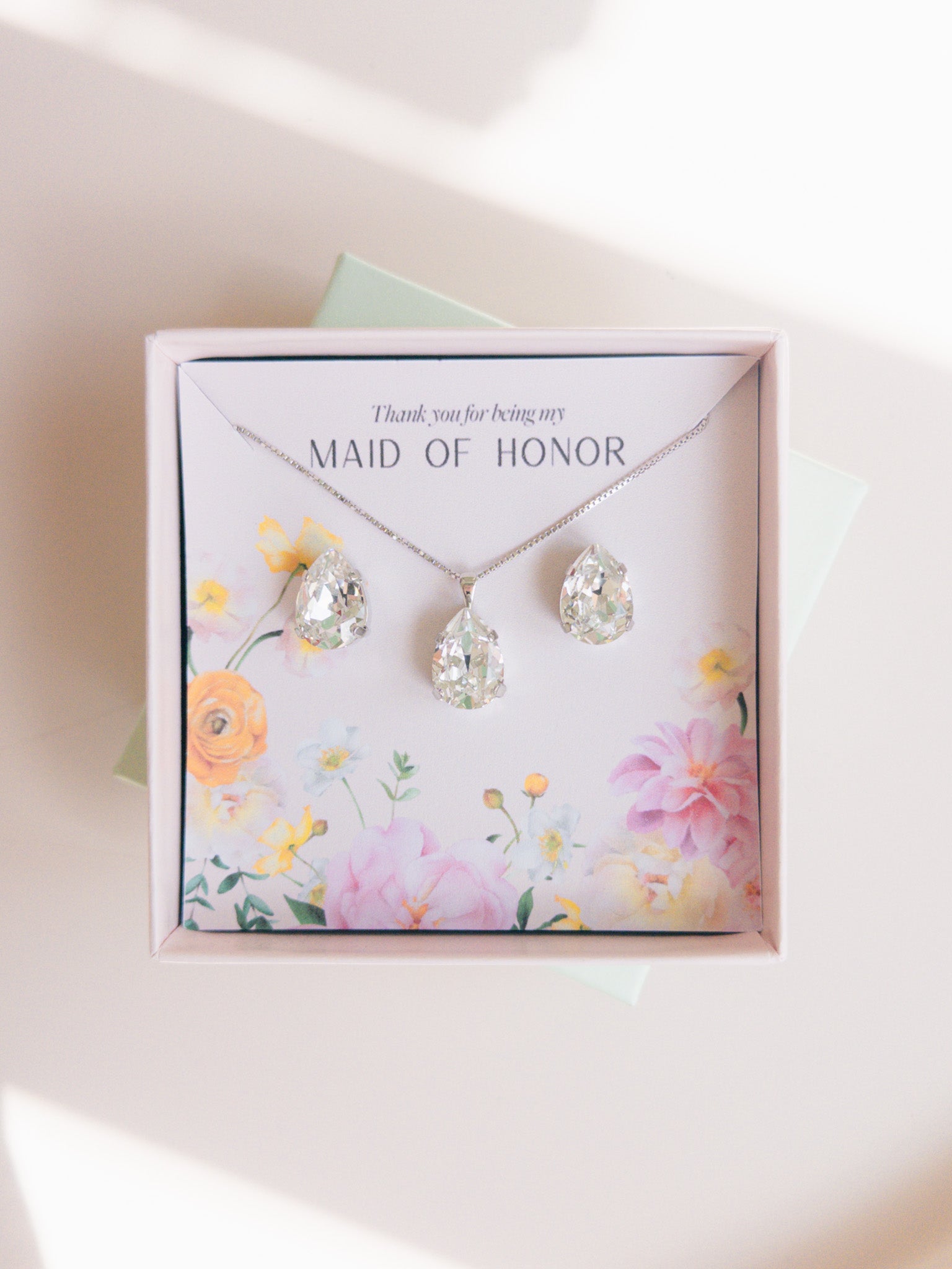 A gift set for a maid of honor consisting of teardrop-shaped crystal studs and a matching pendant necklace, Gift for Bridesmaids and Bridal Party