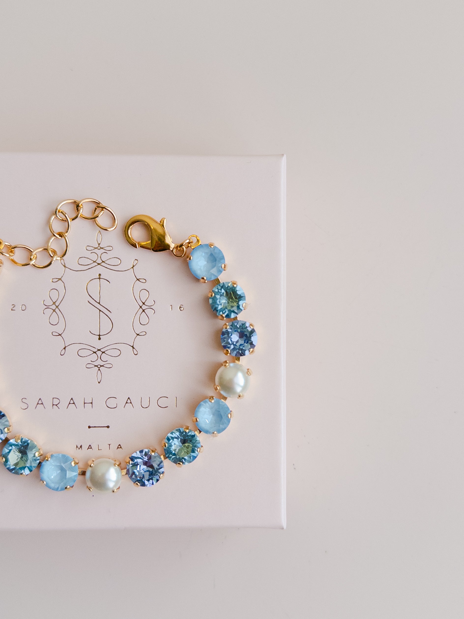 Gold plated bridal bracelet with blue crystals and pearls something blue for wedding