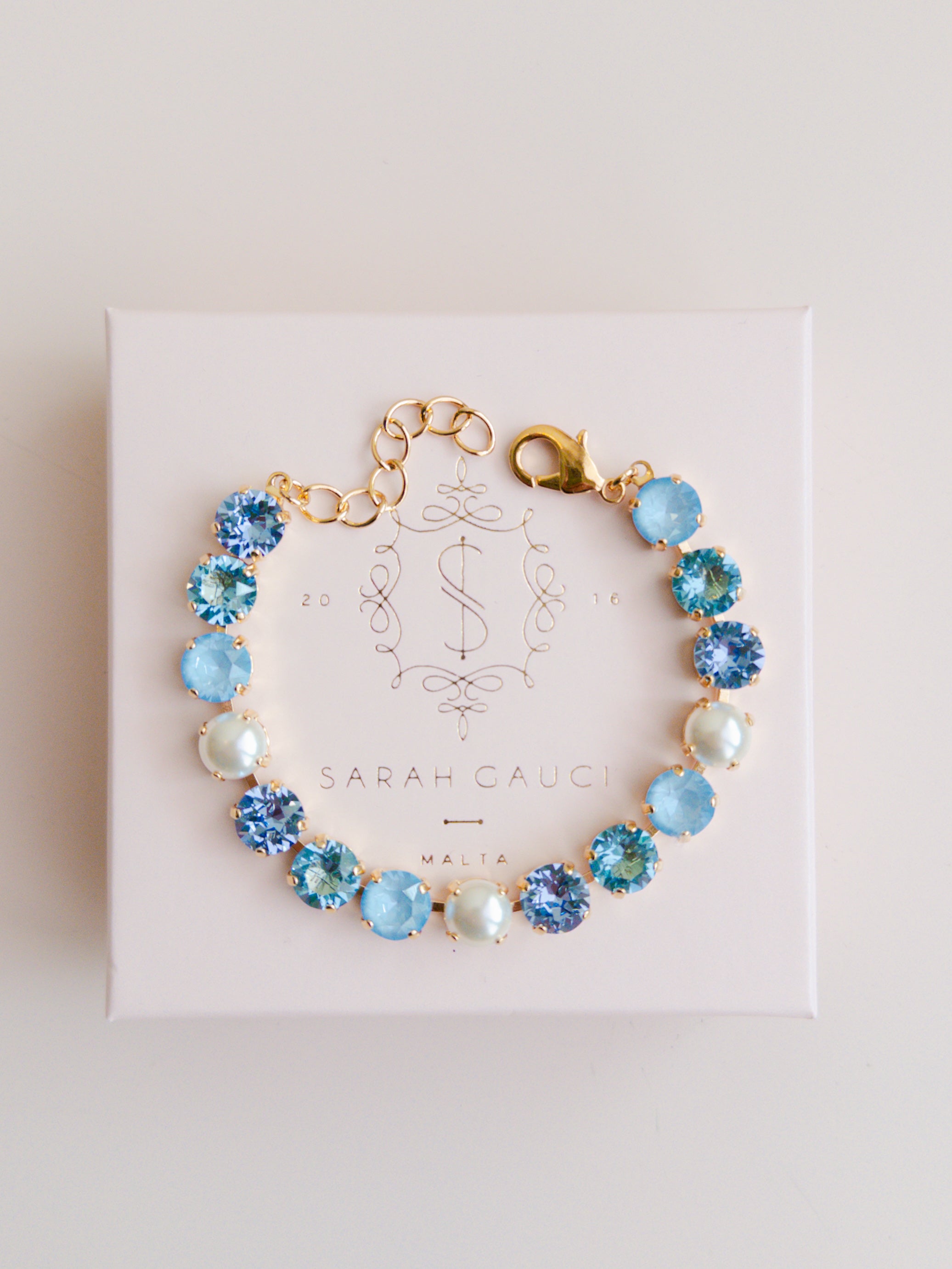 Gold plated bridal bracelet with blue crystals and pearls something blue for wedding