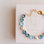 Gold plated bridal bracelet with blue crystals and pearls something blue for wedding