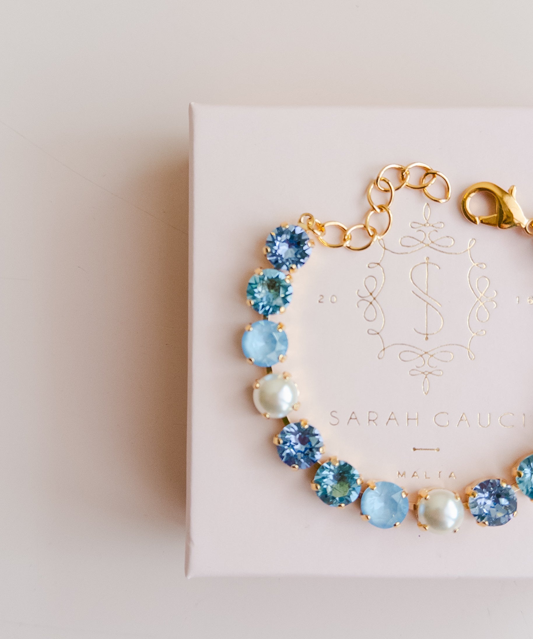 Gold plated bridal bracelet with blue crystals and pearls something blue for wedding