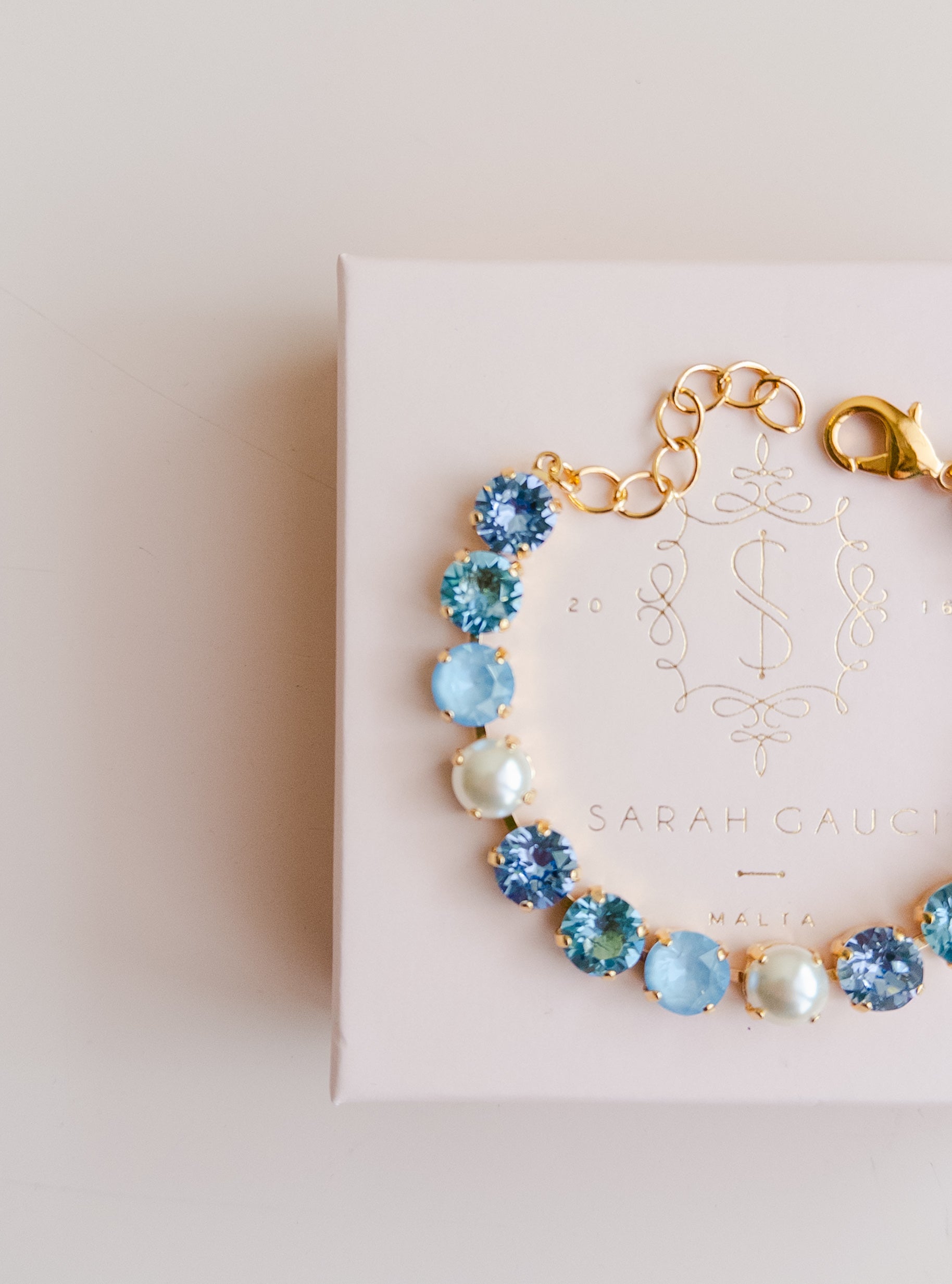 Gold plated bridal bracelet with blue crystals and pearls something blue for wedding