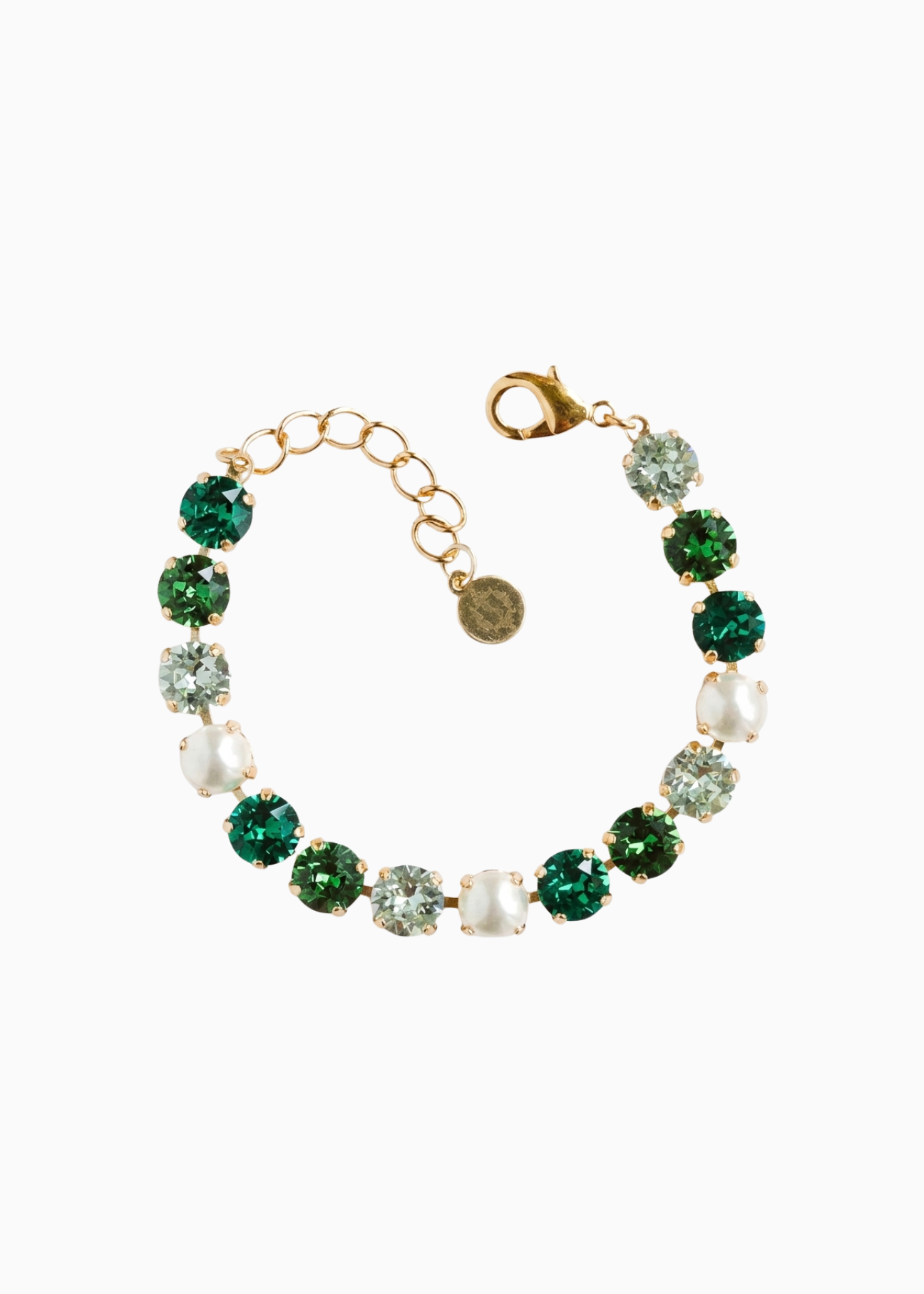 Bracelet with green and clear gemstones on a white background