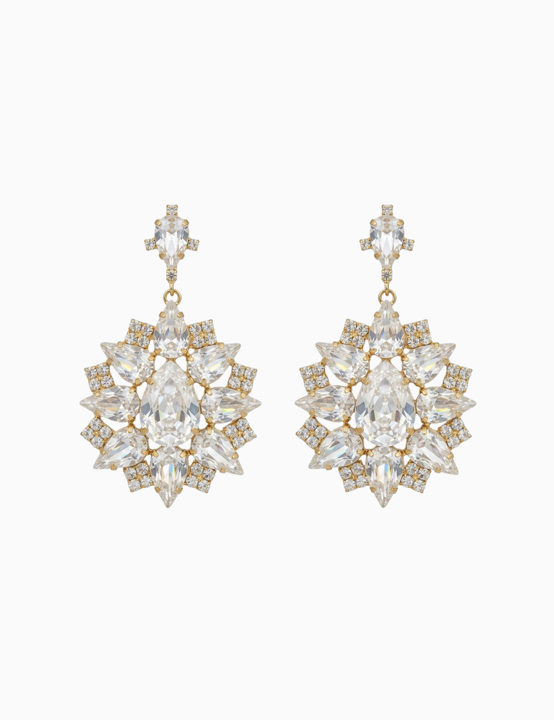 Pair of gold and crystal earrings on a white background