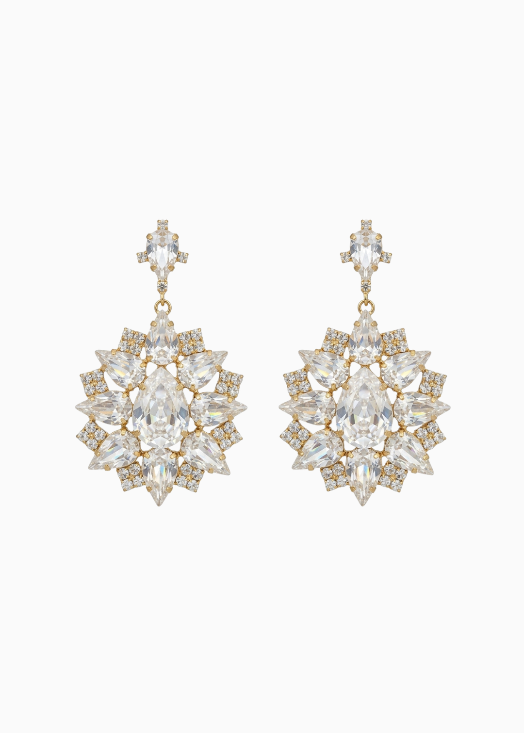 Pair of gold and crystal earrings on a white background