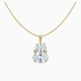 Gold necklace with a clear gemstone pendant on a white background