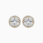 Pair of gold and clear crystal stud earrings on a white background