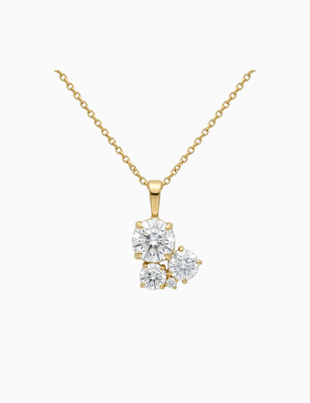 Gold necklace with a diamond pendant on a white background