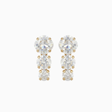 Pair of gold and clear crystal earrings on a white background