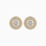 Pair of gold and silver round earrings on a white background