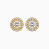 Pair of gold and silver round earrings on a white background