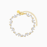 A gold-plated bracelet adorned with leaf-shaped crystals
