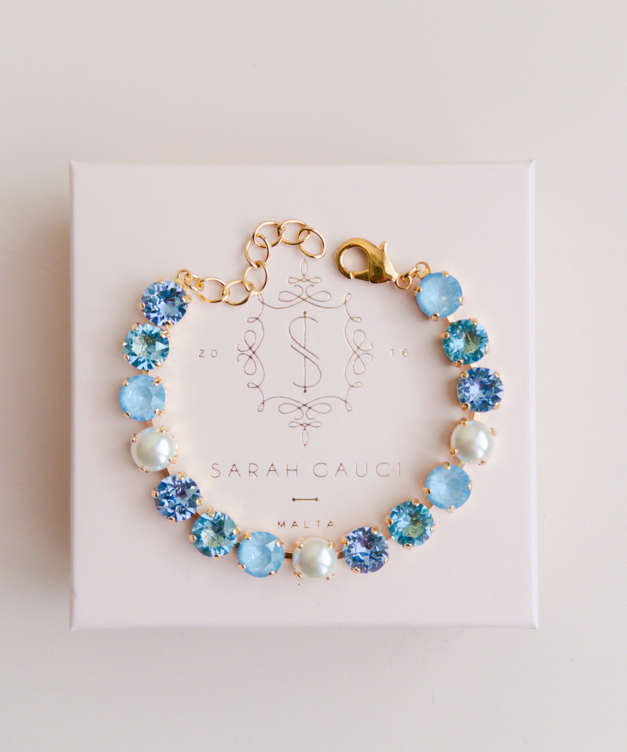 Gold plated bridal bracelet with blue crystals and pearls something blue for wedding