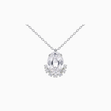 Silver necklace with a teardrop-shaped diamond pendant on a white background