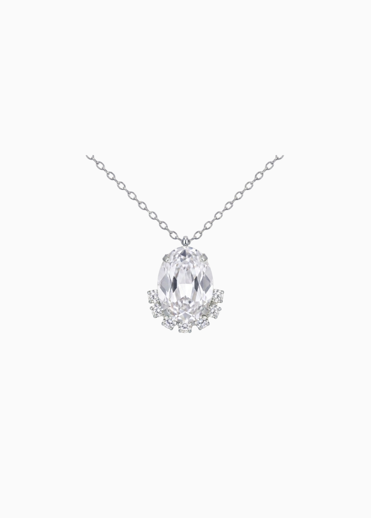 Silver necklace with a teardrop-shaped diamond pendant on a white background