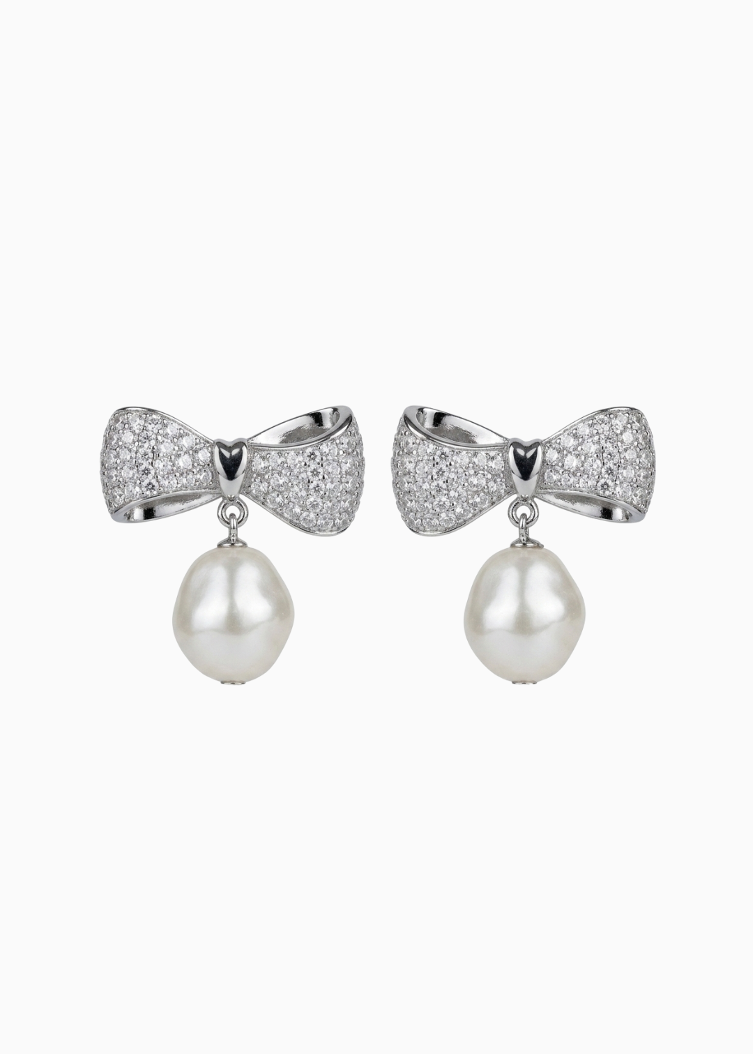 Pair of earrings with bow design and pearl drops on a white background