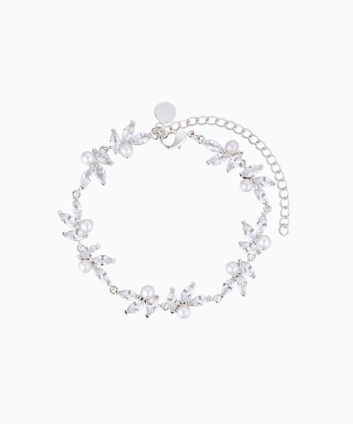 A rhodium-plated bracelet adorned with high-quality shimmering crystals and pearls, featuring a floral pattern and a chain extender.