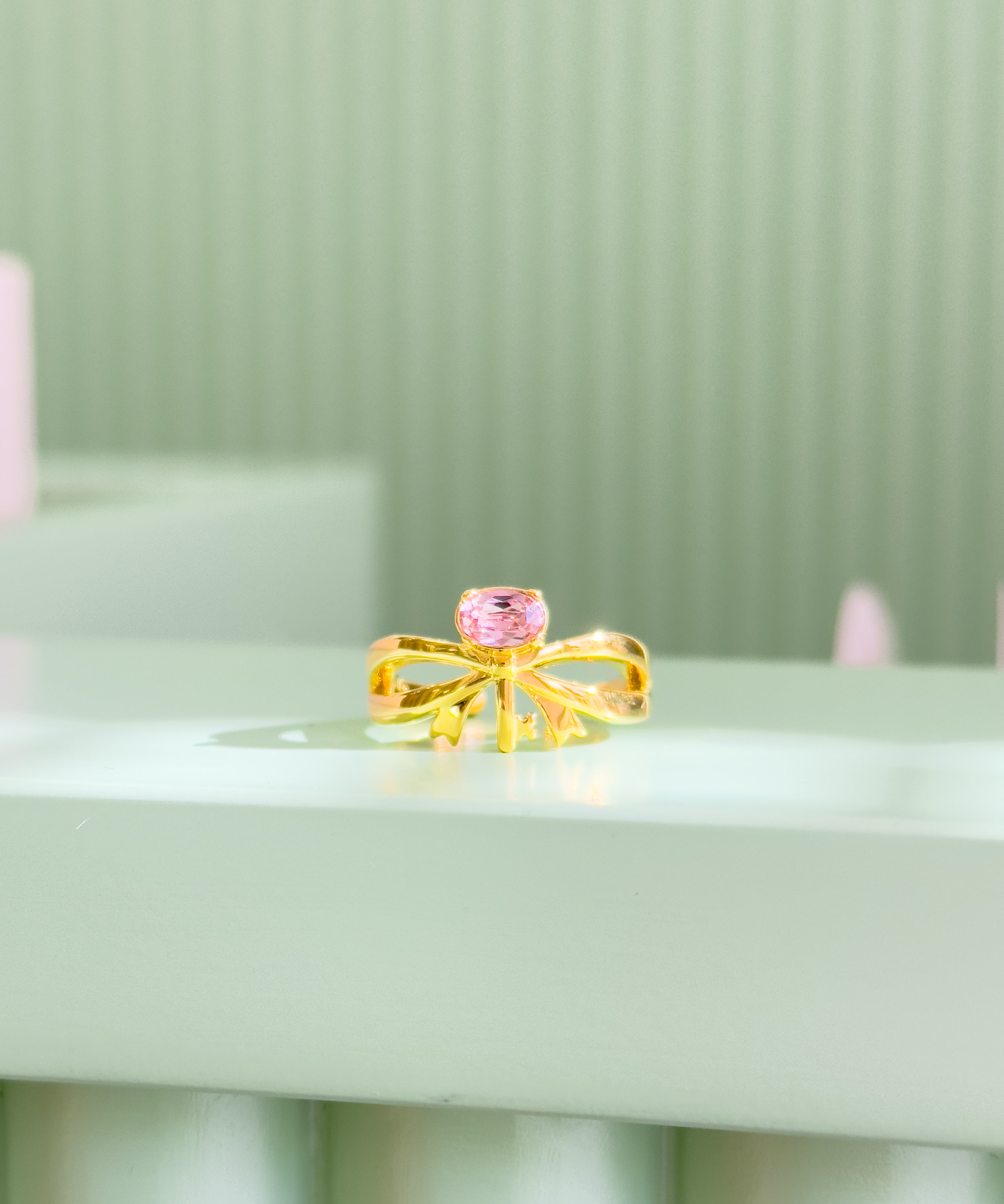 A bow Ring in Gold Plating by Sarah Gauci