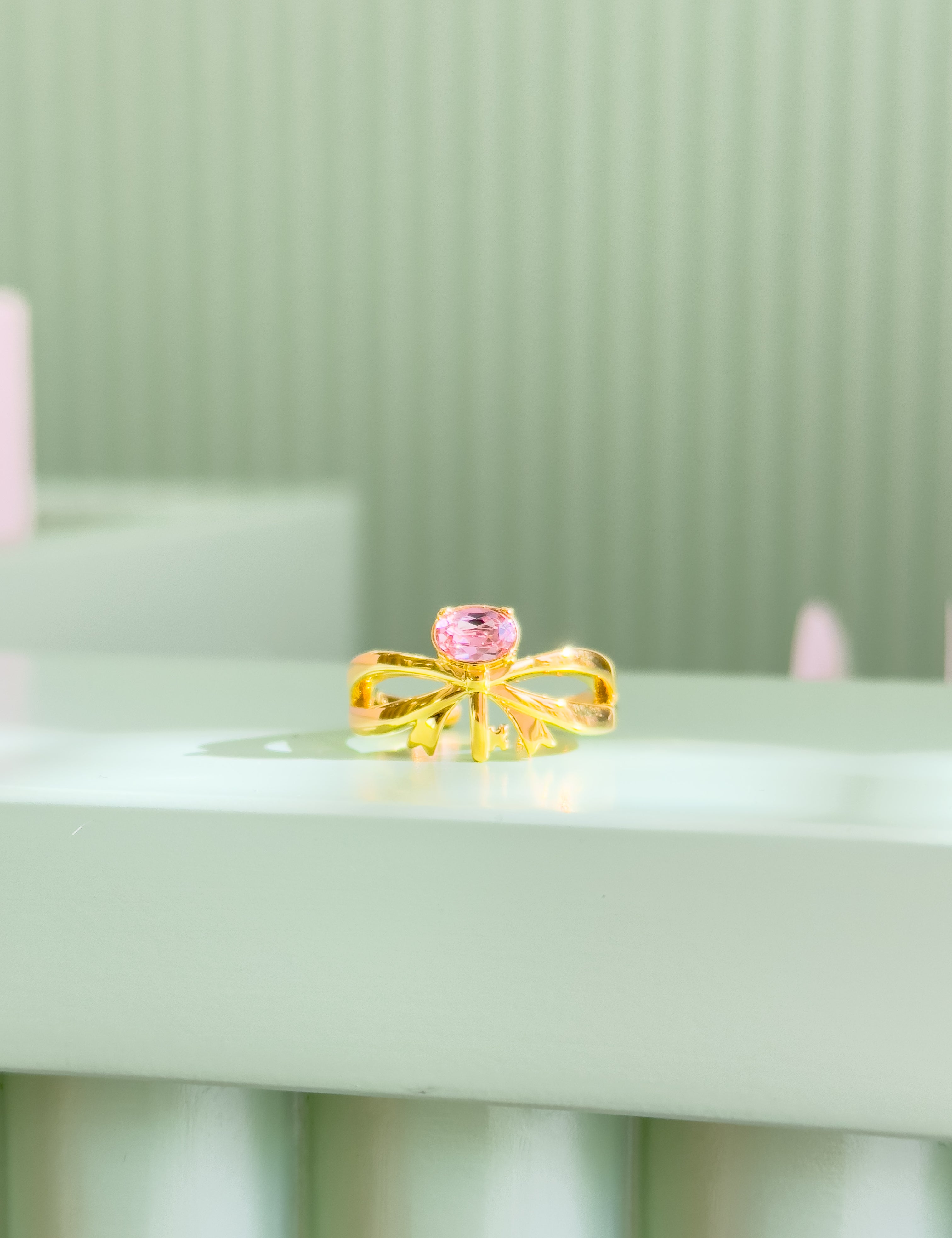 A bow Ring in Gold Plating by Sarah Gauci