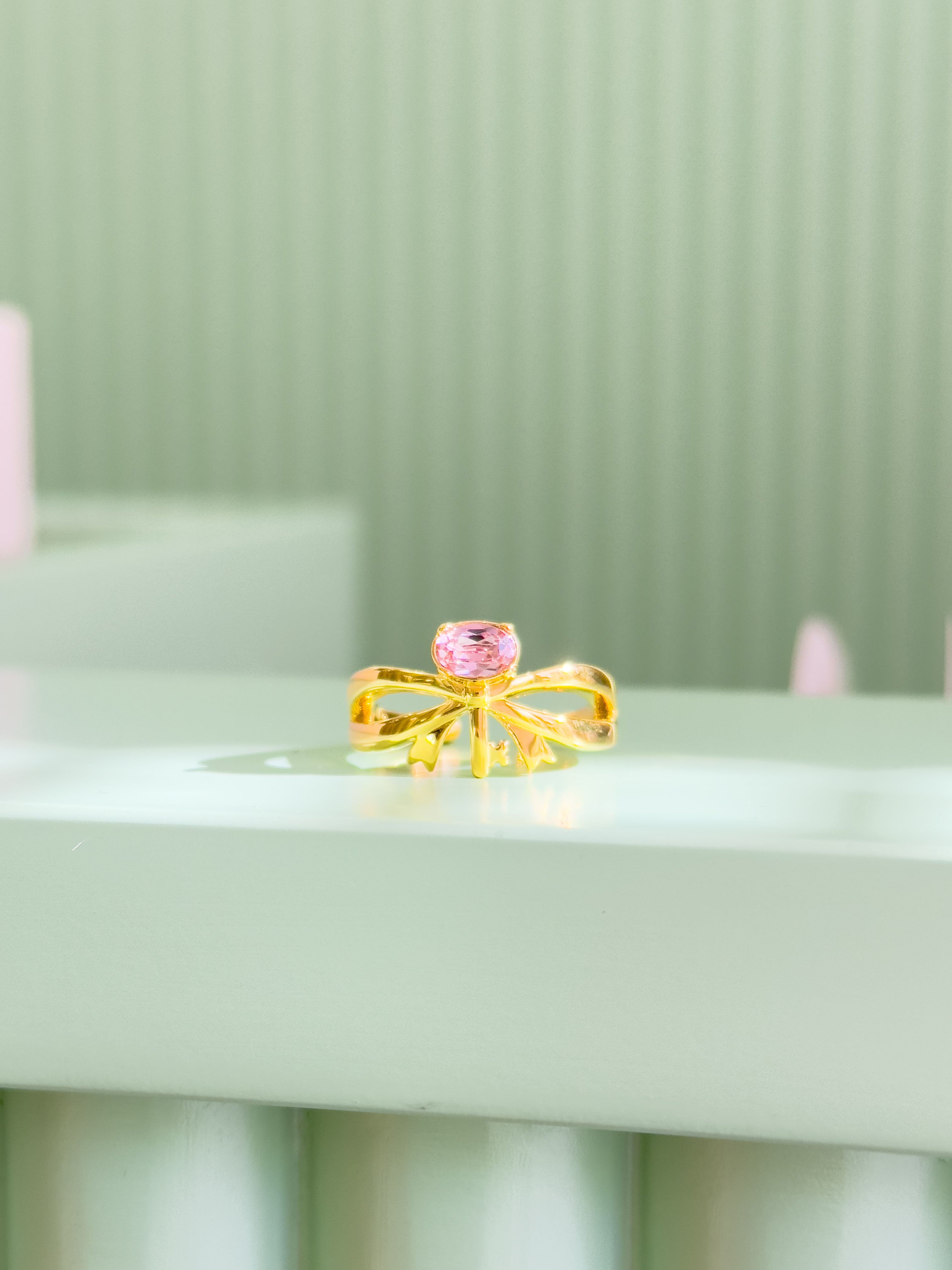 A bow Ring in Gold Plating by Sarah Gauci