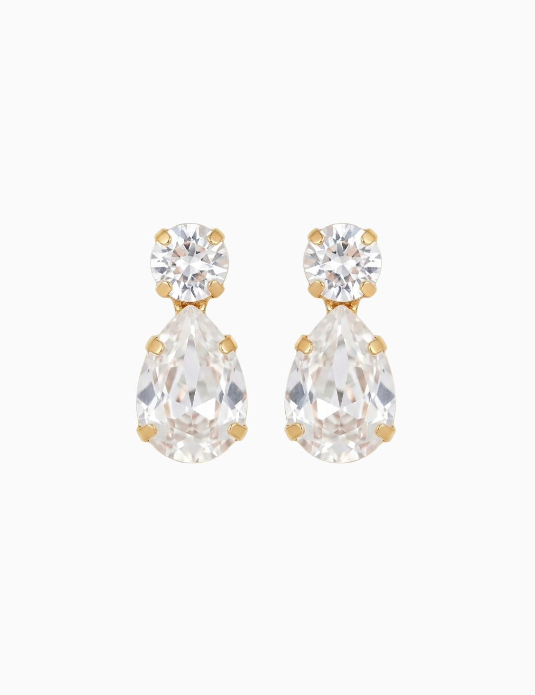 Pair of teardrop-shaped earrings with clear gemstones on a white background