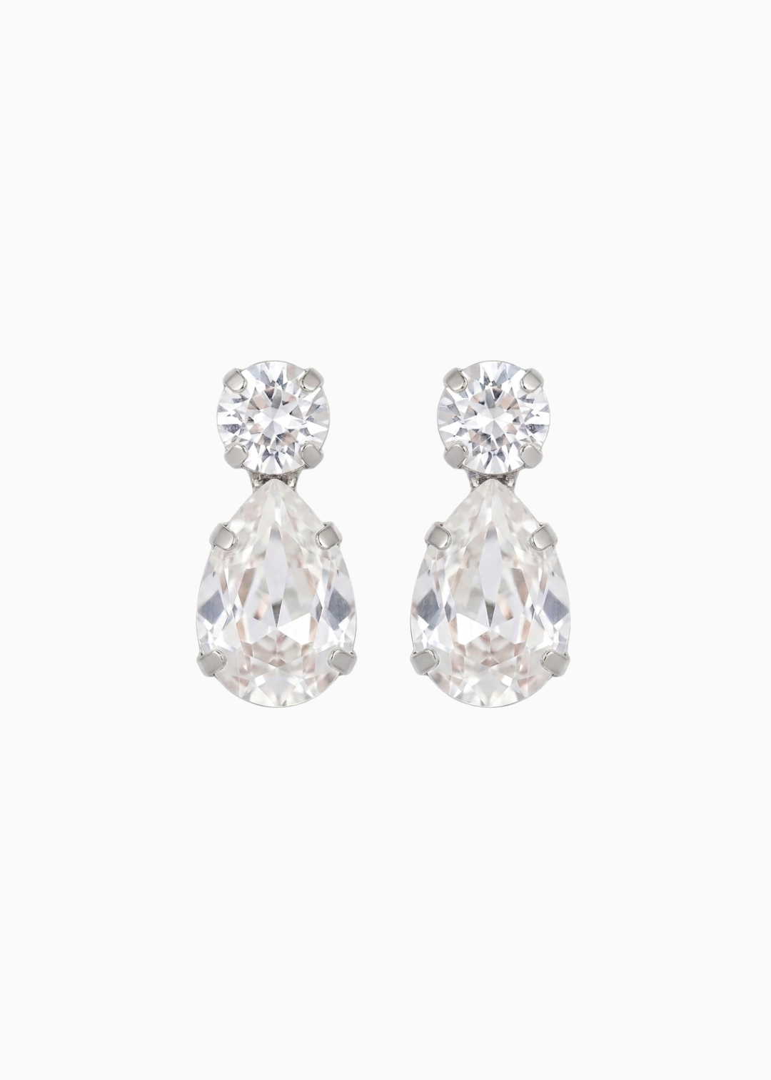 Pair of teardrop-shaped crystal earrings on a white background