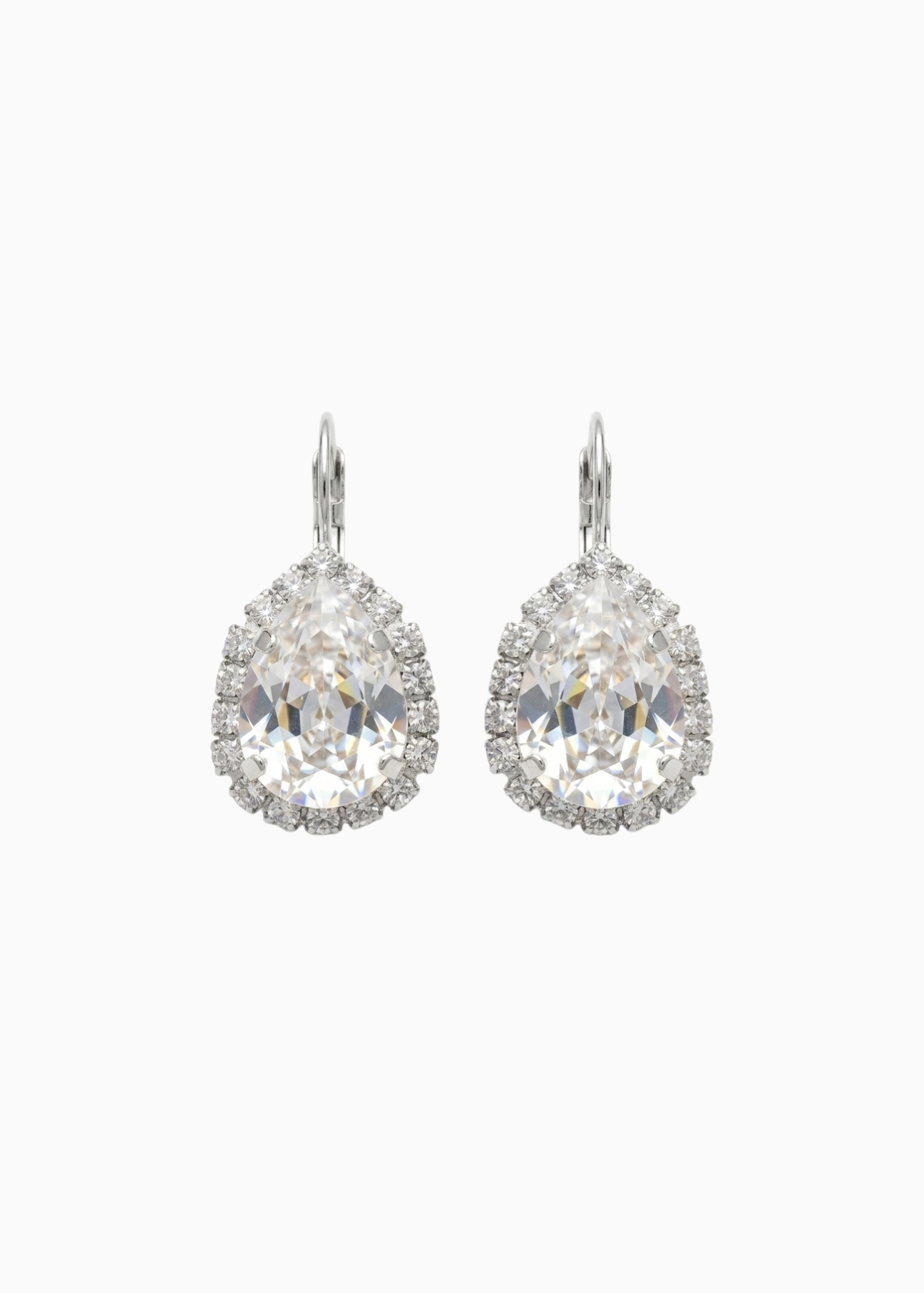 Pair of silver earrings with clear gemstones on a white background


