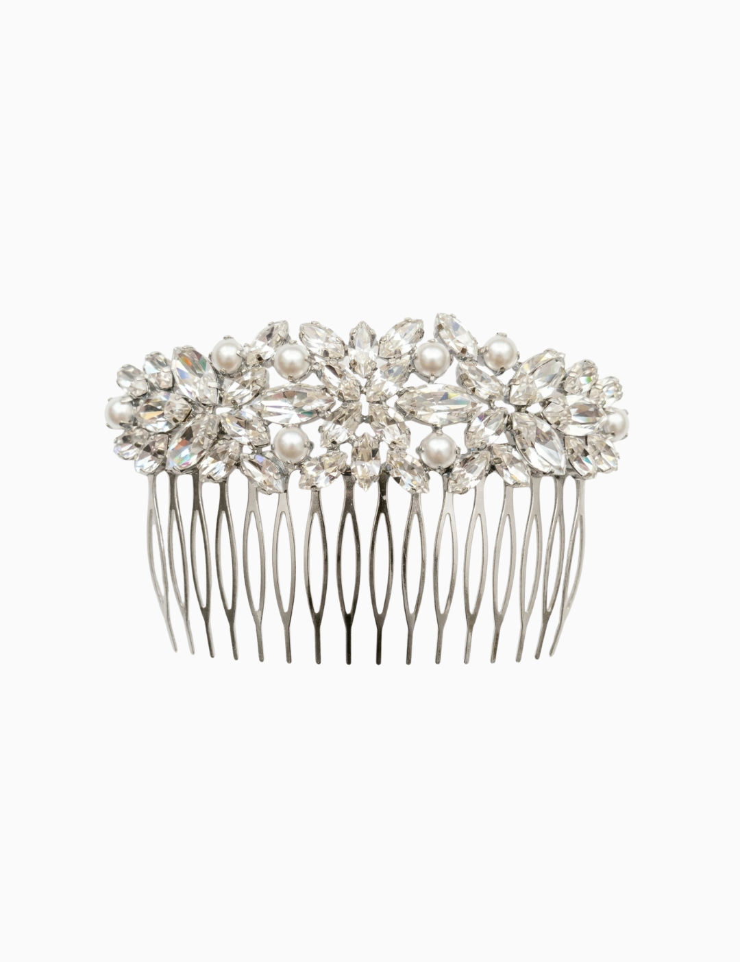 Silver hair comb with pearls and crystals on a white background