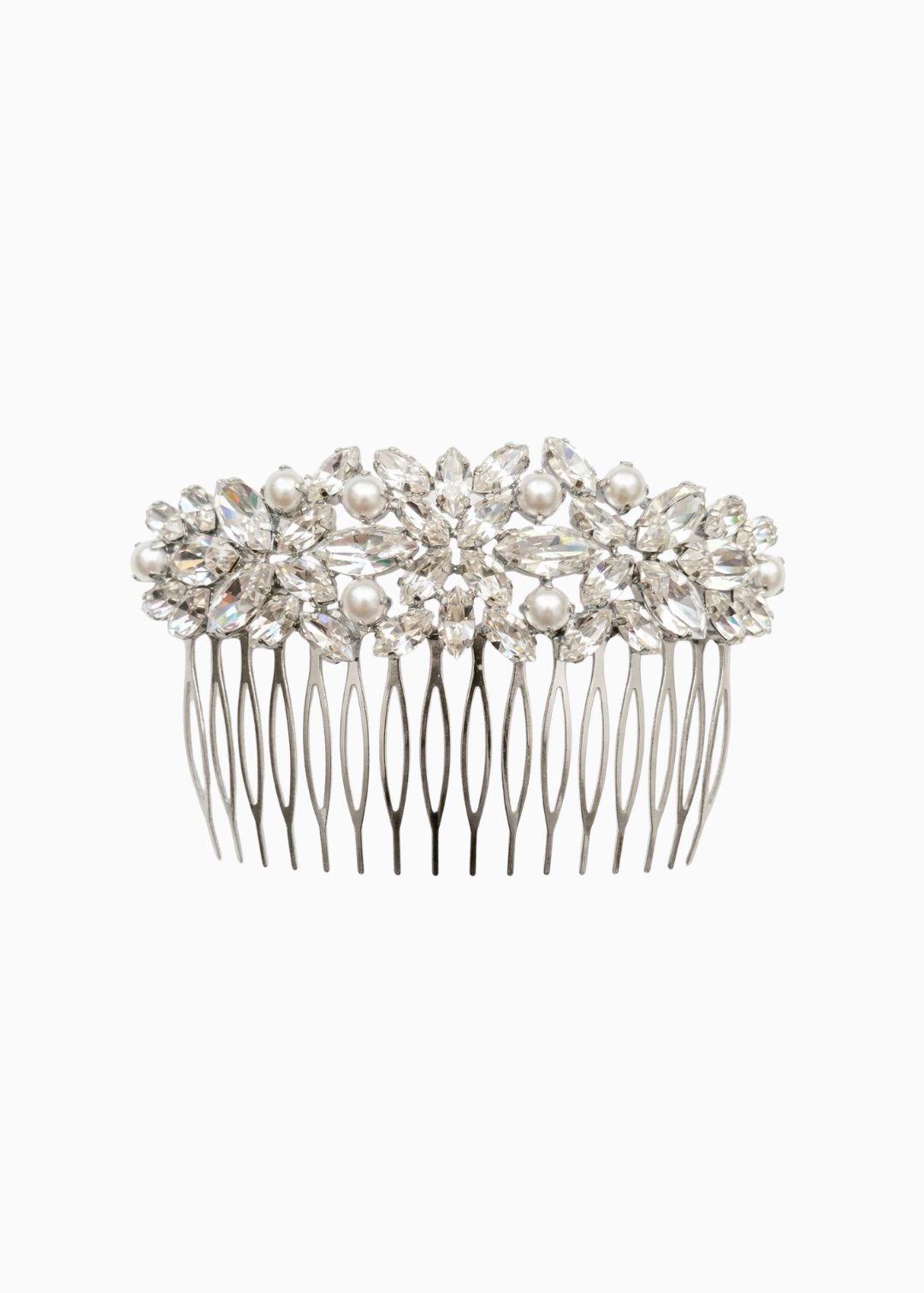 Silver hair comb with pearls and crystals on a white background