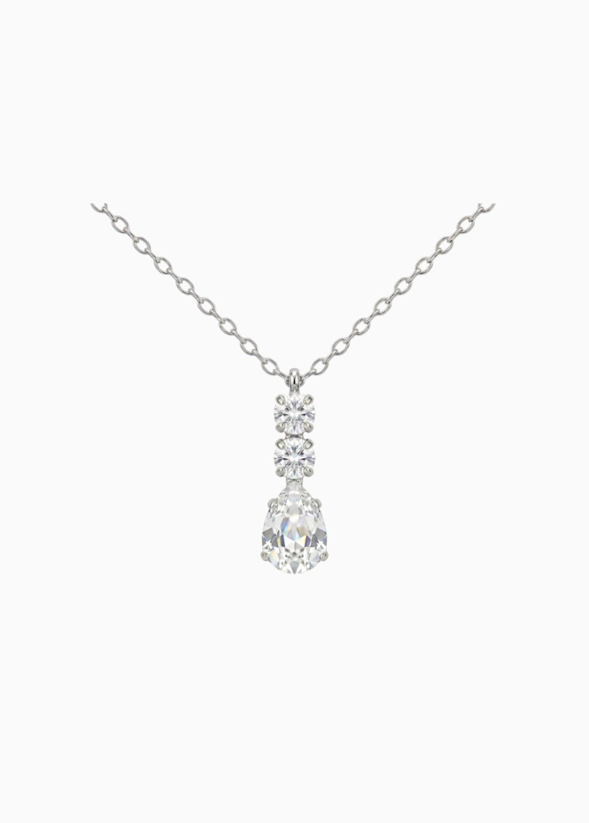 Silver necklace with a teardrop-shaped diamond pendant on a white background