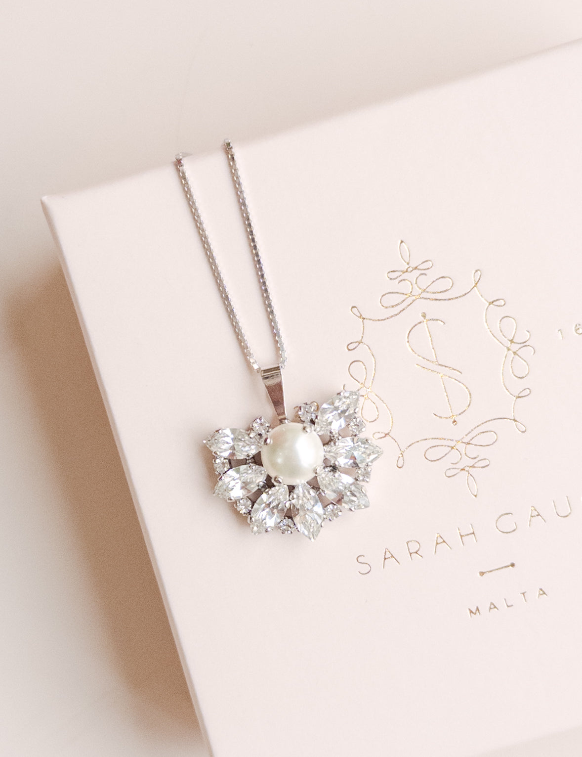 Pearl necklace on a Sarah Gauci branded box