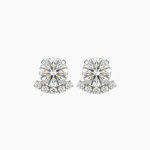 Pair of diamond stud earrings on a white background