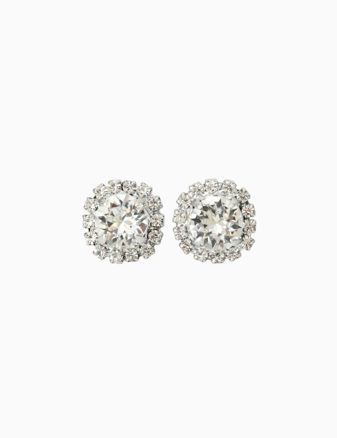 Pair of silver stud earrings with clear gemstones on a white background