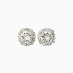 Pair of silver stud earrings with clear gemstones on a white background