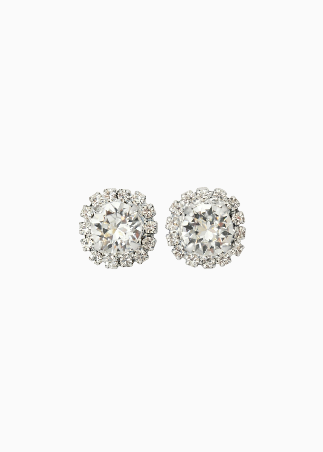 Pair of silver stud earrings with clear gemstones on a white background