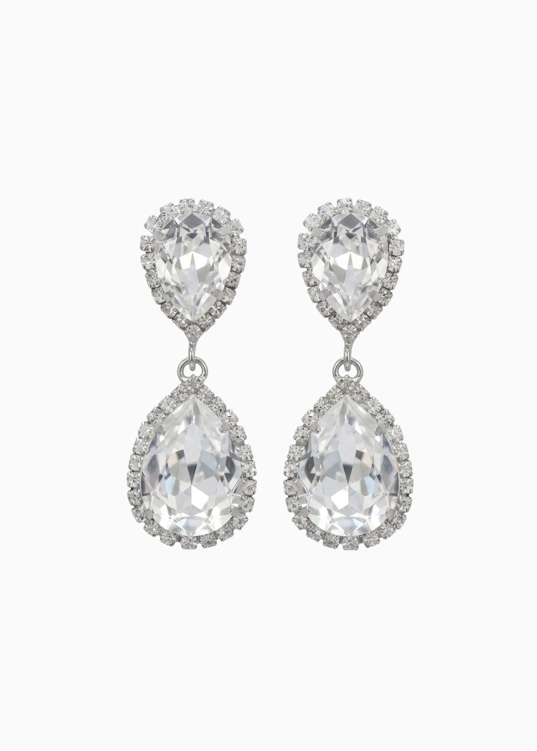 Pair of teardrop-shaped crystal earrings on a white background