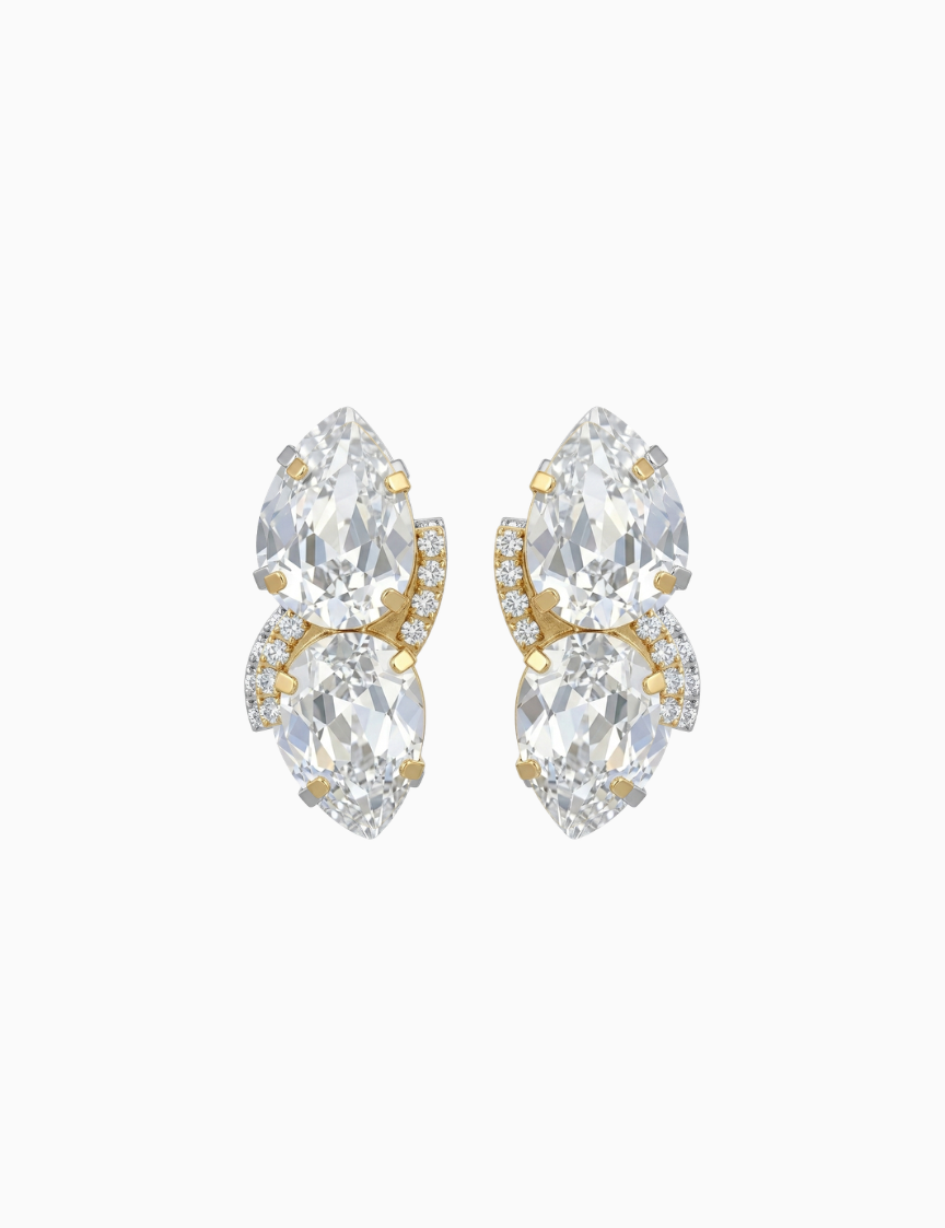 Pair of gold and clear crystal earrings on a white background
