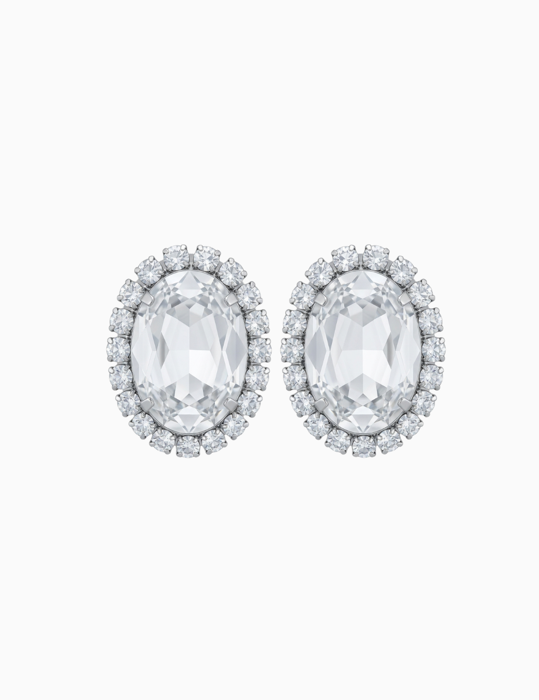 Pair of silver earrings with clear gemstones on a white background